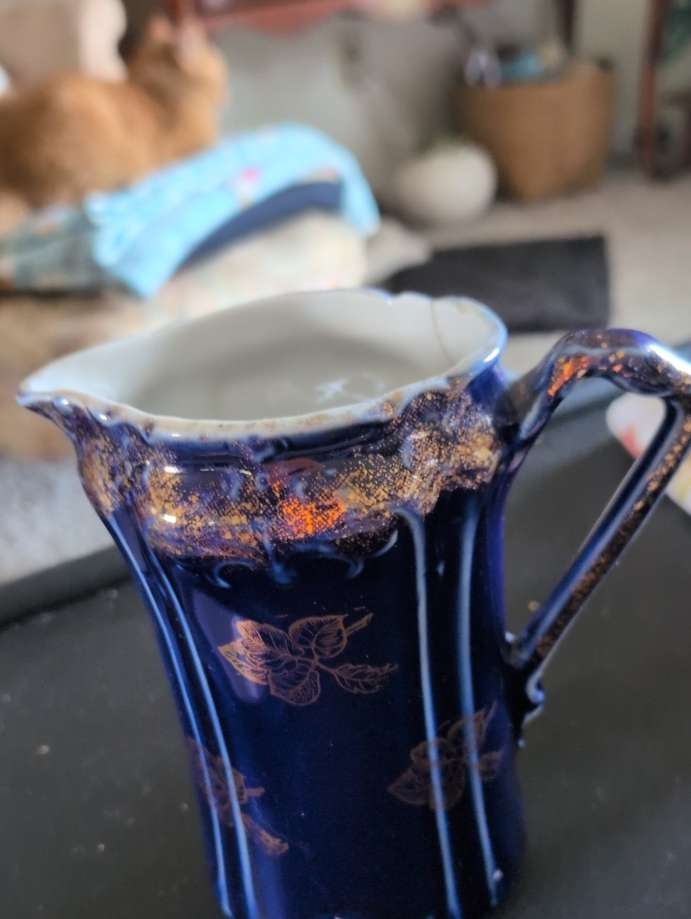 vintage. Elegant Cobalt Blue Porcelain Pitcher with Gold Accents